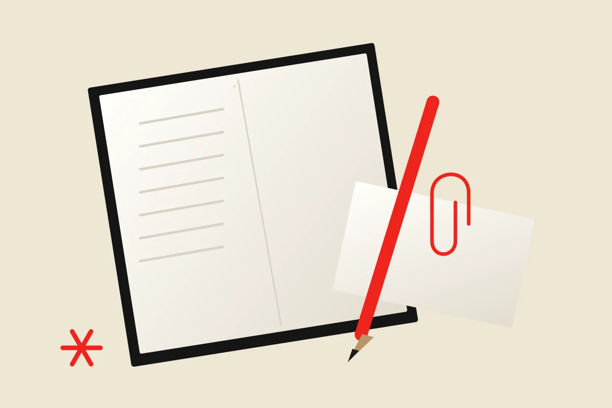 A notebook, loose cards and a red pencil, illustrating a practical testing kit.